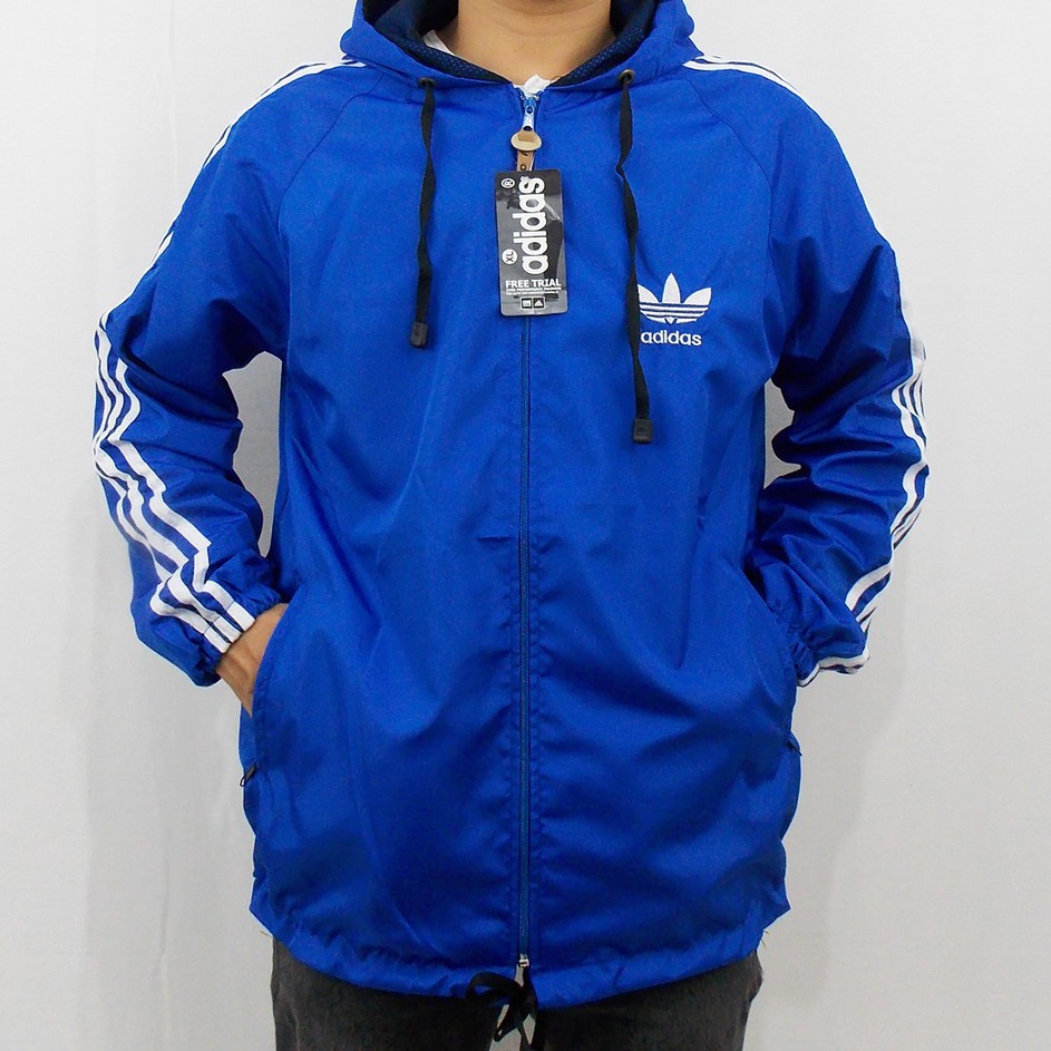 Segera Dapatkan JAKET ADIDAS PARASUT WINDBREAKER BIRU LIST PUTIH  - JAKET PARASUT RUNNING - JAKET OL