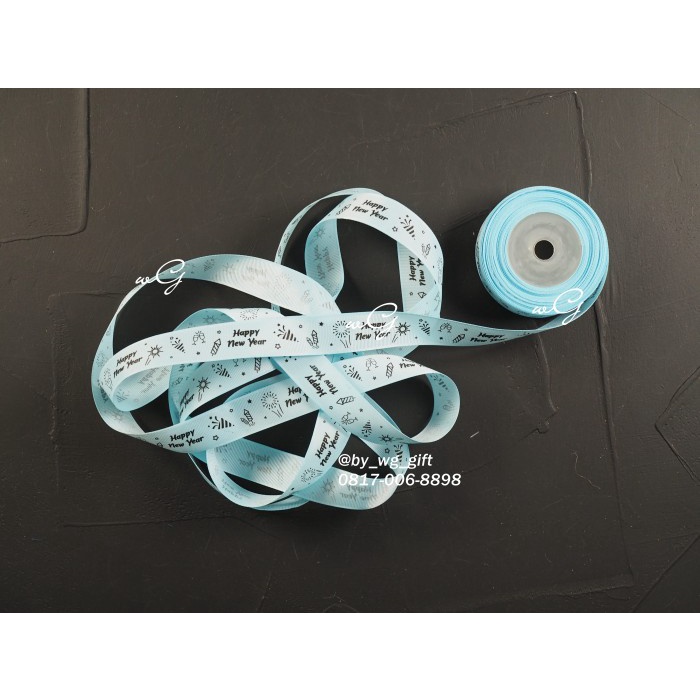 

Pita Happy New Year - Baby Blue ;Lebar 2.5 cm ;Panjang 20 yard