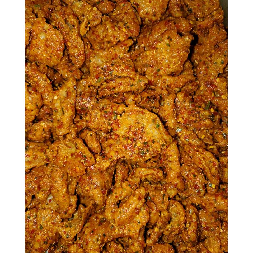 

Keripik Kulit Ayam Crispy Pedas Daun Jeruk 1/2Kg