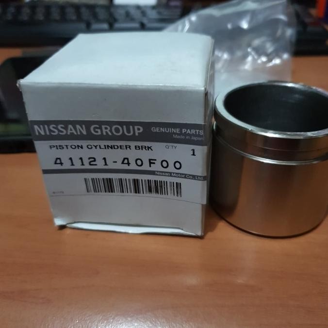 GRAND LIVINA L10 PISTON CALIPER REM DEPAN NISSAN ORIGINAL JAPAN