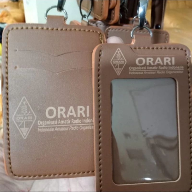 

HOLDER KALUNG ID CARD LOGO ORARI COKLAT BEST QUALITY PREMIUM