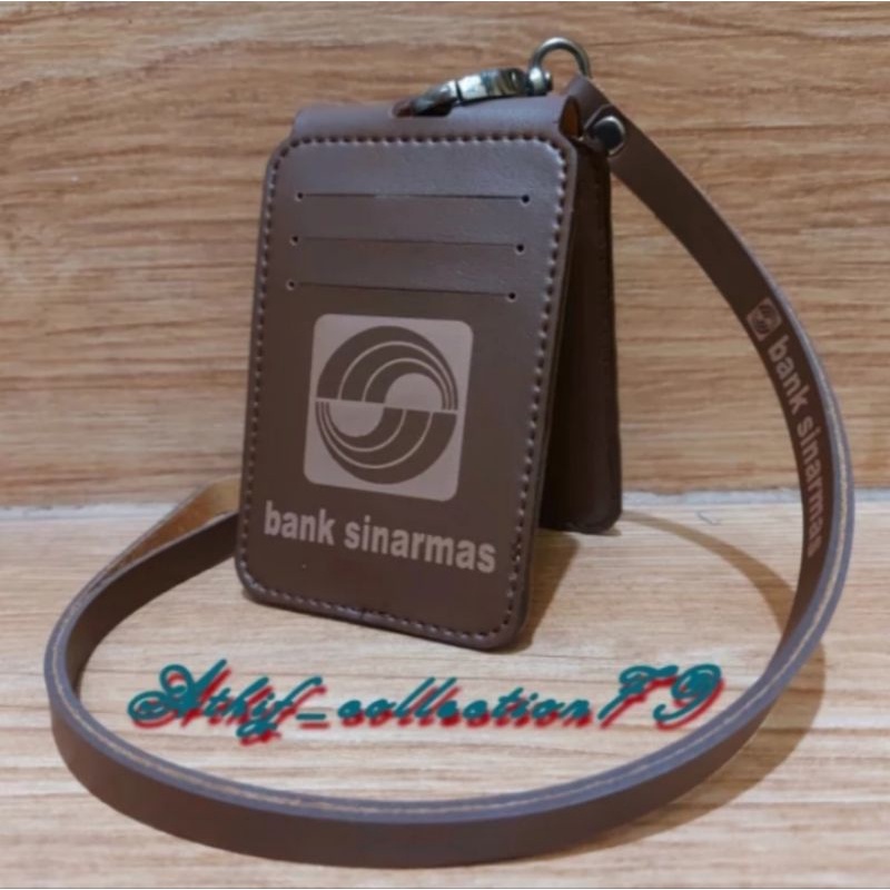 

HOLDER KALUNG ID CARD LOGO BNK SIBAR MAS MODEL LIPAT COKLAT BEST QUALITY PREMIUM