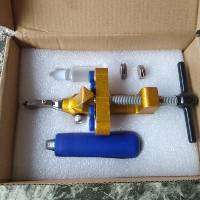 

alat pemotong kaca, keramik, granit, multi fungsi/glass tile opener
