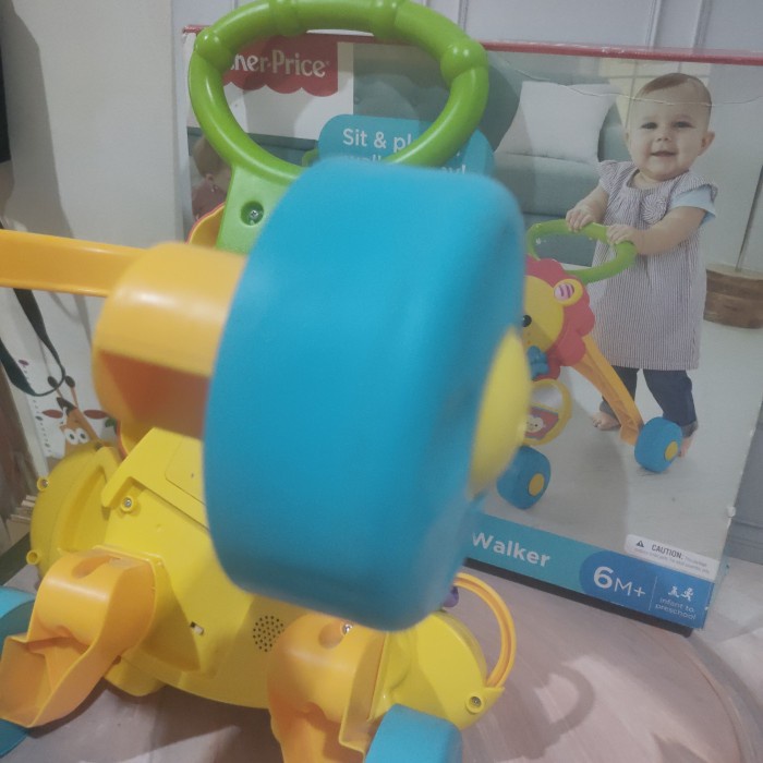 fisher price musical lion walker