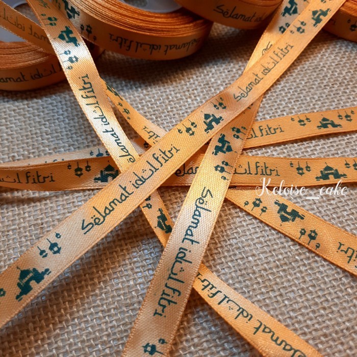 

Pita Satin Idul Fitri Wrn Coklat Terang/Gold Lebar 1 Cm-Pjg 18 Meter 008