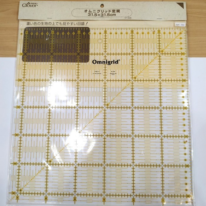 

Penggaris Patchwork Clover 57-626 Omnigrid 31.5X31.5Cm