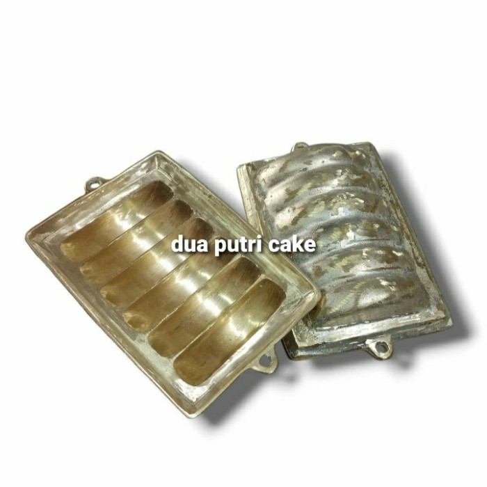 

Cetakan Kue Pancong/Pukis/Bandros Isi 6 Lubang Bahan % Kuningan