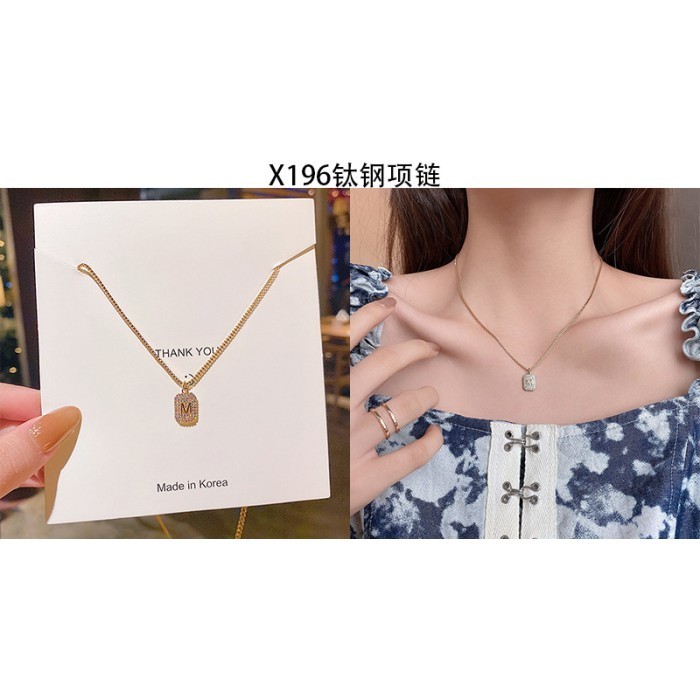 Laila Gems Kalung Liontin Huruf M Kristal Emas Titanium Wanita