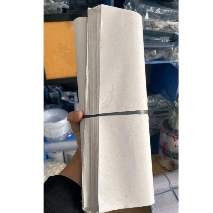 

Kertas Nasi Padang Kw 1 Motif / Kertas pembungkus Nasi Padang per 1kg