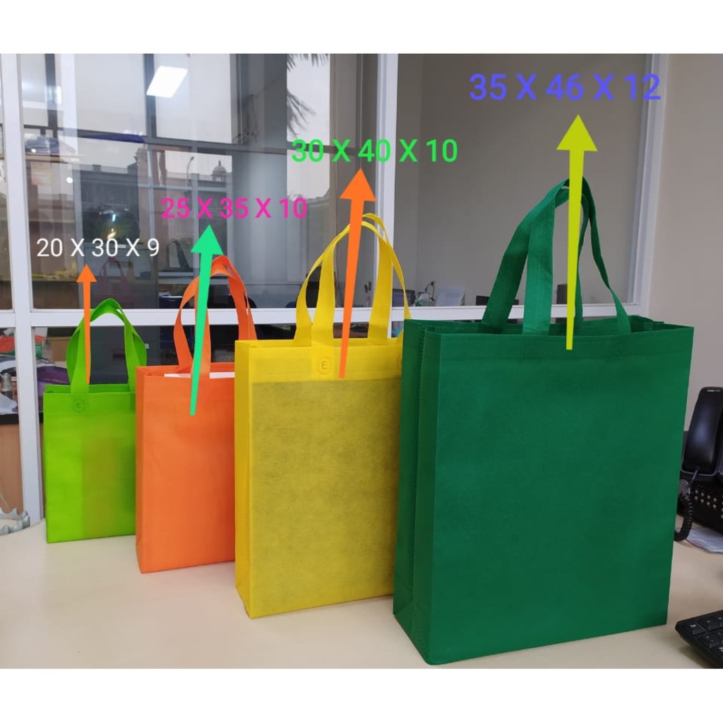 

Tas Box Bag/ Tas Kain Spunbond/ Goodie Bag/ Tas Box Bag 35X46 Perlusin