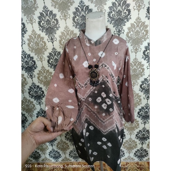 Tunik jumputan Palembang