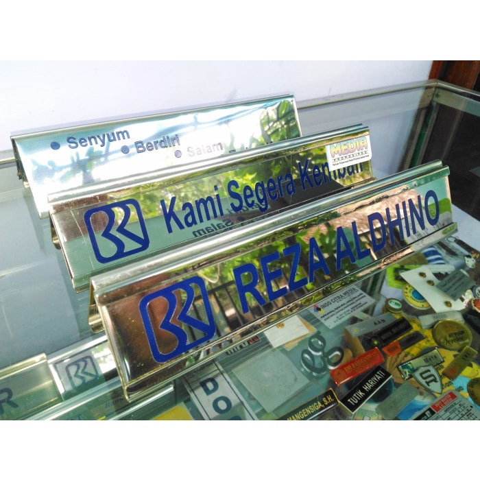 

Nama Meja / Name Desk Stainless Berholder Stainless 25x7cm (Bank BRI)