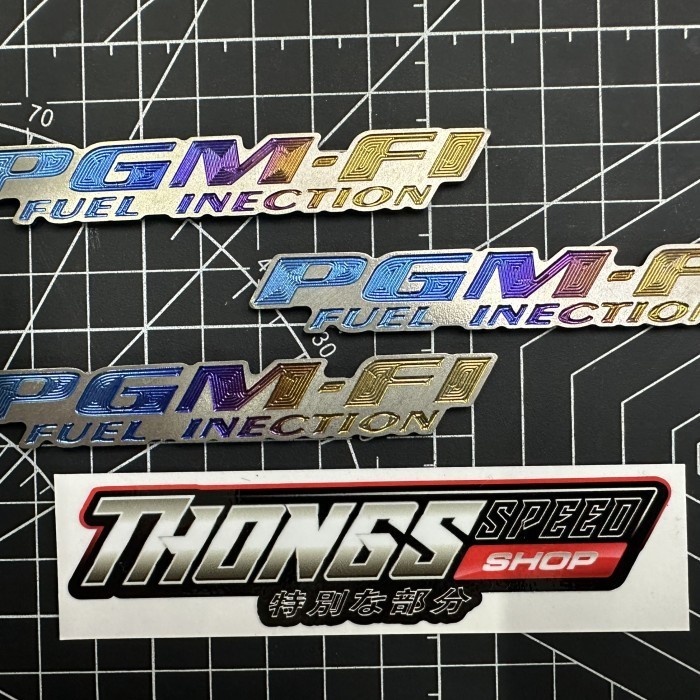 Emblem PGM-FI Titanium