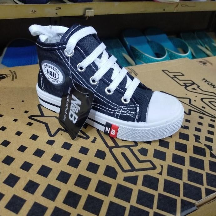 Sepatu anak sekolah SD warrior nb tali hitam putih  GM