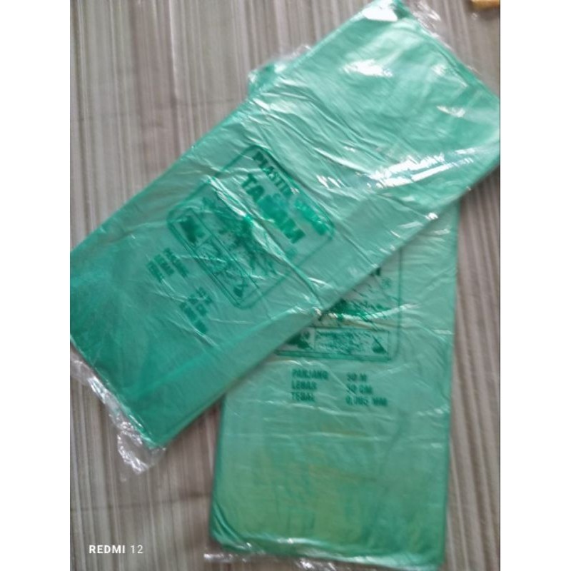 plastik meteran / plastik balon warna hijau cap tanam