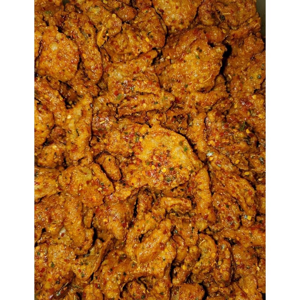 

Keripik Kulit Ayam Crispy Pedas Daun Jeruk 1/2Kg