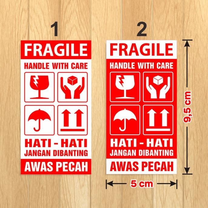 

Sticker Label Fragile Hati-Hati Awas Pecah 9,5x5 cm (1 roll/ 500 pcs)