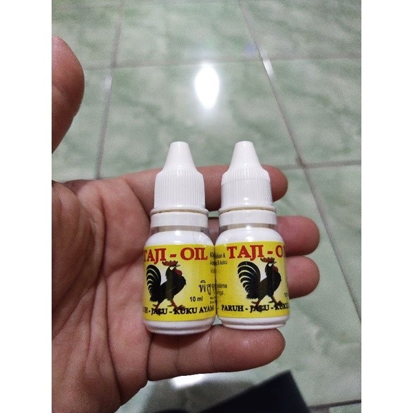 TAJI OIL OBAT PENGERAS PENEBAL JALU PATUK KUKU AYAM ADUAN