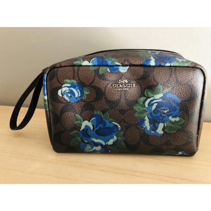 Tas clutch wanita Coach