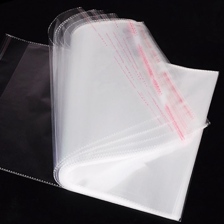 

[PRODUK AZMWE99] PLASTIK OPP SEAL LEM-PACKING BAJU - PER 100pcs-standard 7735