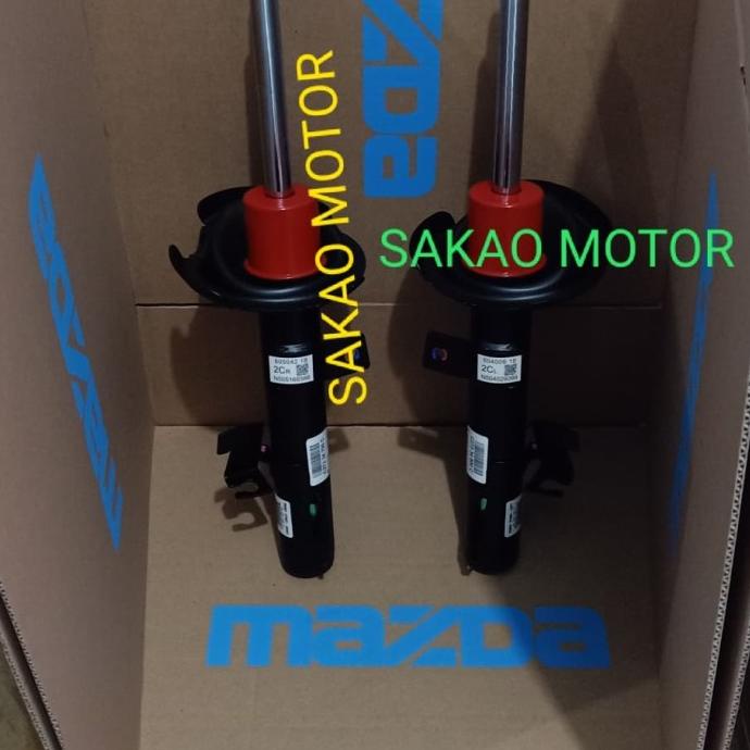 shockbreaker depan mazda Biante original fomoco