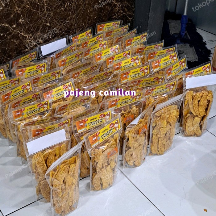 

Keripik - Terlaris Keripik Pisang Centil Keju Karamel Paket Isi 8 Pcs @250 Gram