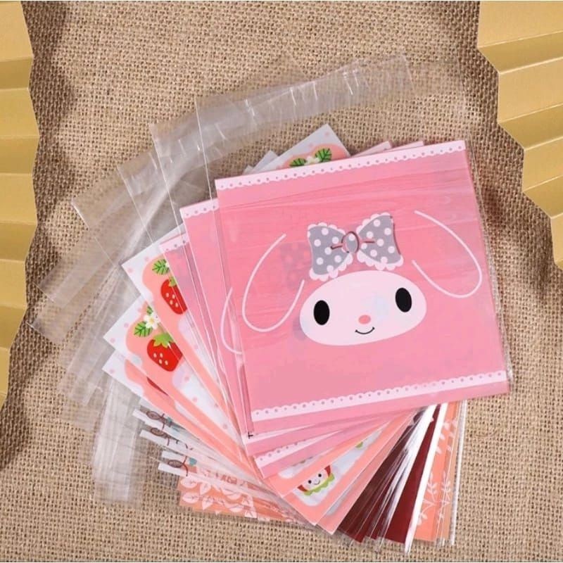 

(isi 100pcs ) plastik cookies hawaii,melody bunga 10x10cm , plastik cookies/plastik kemasan kue, permen.(red)