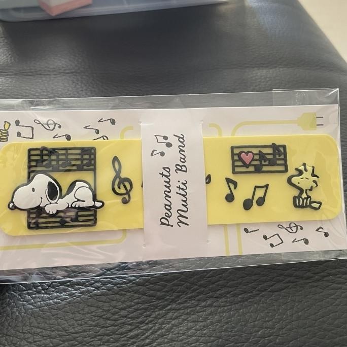 

snoopy multi band yellow with button/ pengikat kabel snoopy