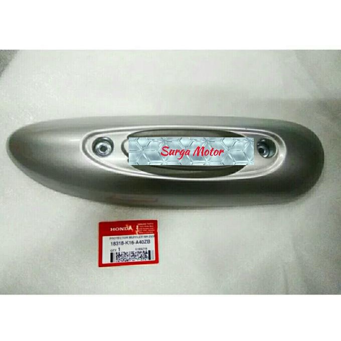 Tutup knalpot Scoopy FI ESP silver . Cover knalpot Scoopy . ORI HONDA