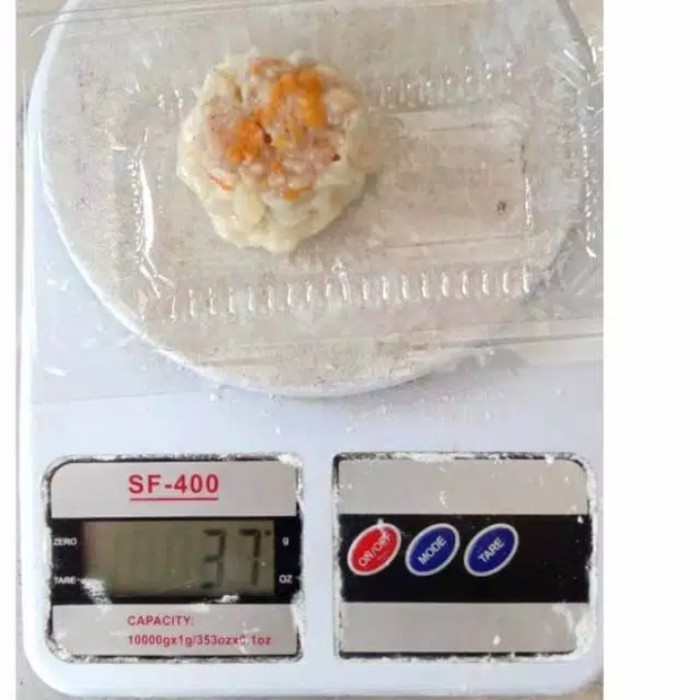 

Dimsum Ayam Frozen mix topping isi 50 pcs dengan Saos Merah
