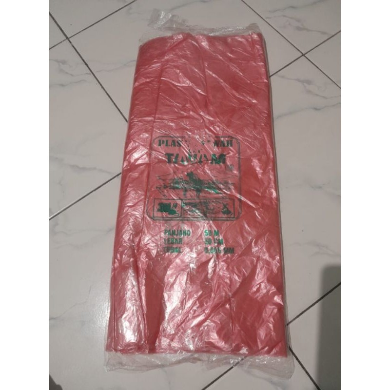 plastik meteran / plastik balon warna merahh cap tanam