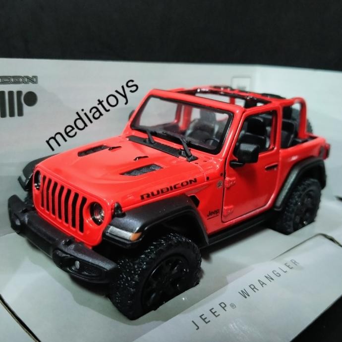diecast kinsmart jeep wrangler rubicon . merah