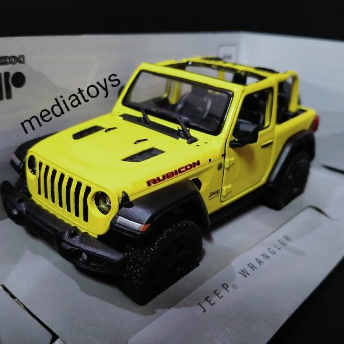 diecast kinsmart jeep wrangler rubicon .kuning