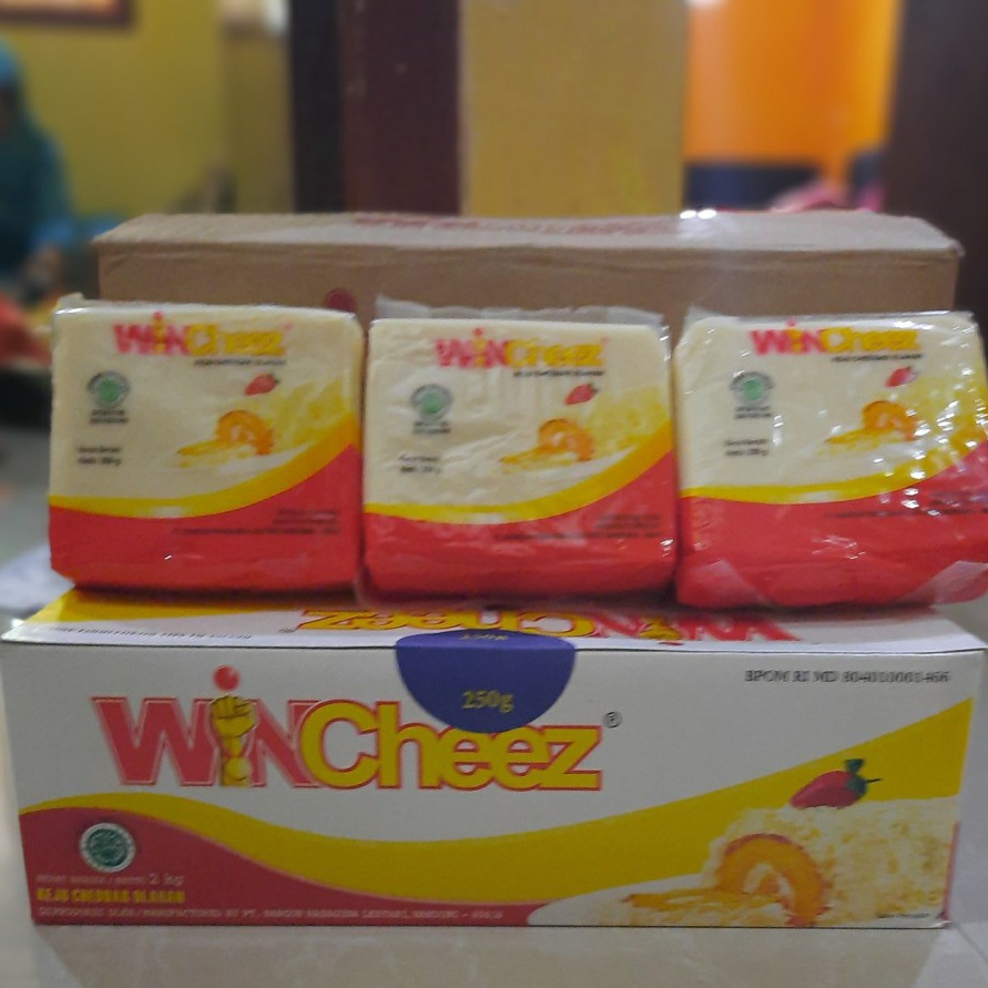 

IMPOR TERBARU Keju wincheez isi 8 x 250 gram , cheese cheddar blok 250gr box