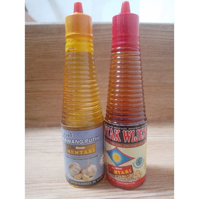 

Duo minyak, minyak wijen dan minyak bawang putih cap sinar mentari 150ml