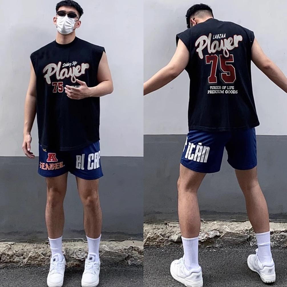 ATASAN ROMPI PAKAIAN LUAR KANVAS GAYA HIP-HOP AMERIKA ATASAN ROMPI PRIA MUSIM PANAS BARU CETAK HURUF