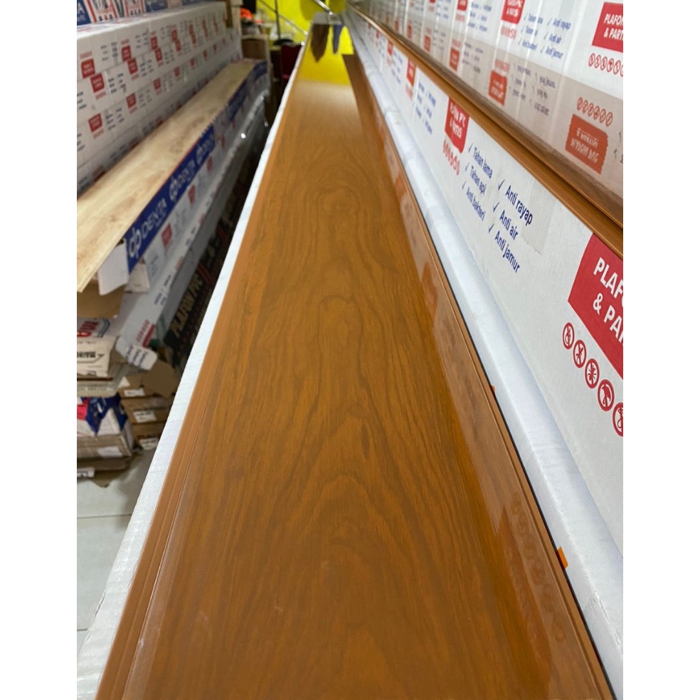 Dapatkan Sekarang5m0La Plafon PVC serat kayu coklat glossy 7mm Lokal