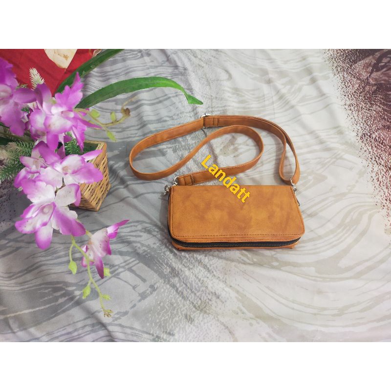 Dompet taji resleting, Isi 12 + Lurus