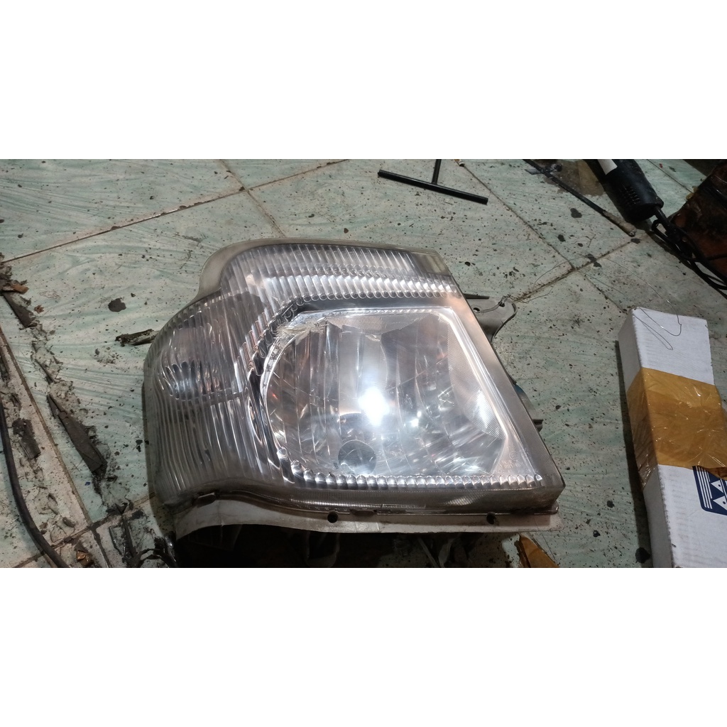 Headlamp isuzu traga original rengat