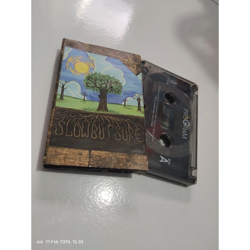 kaset pita slank / slow but sure