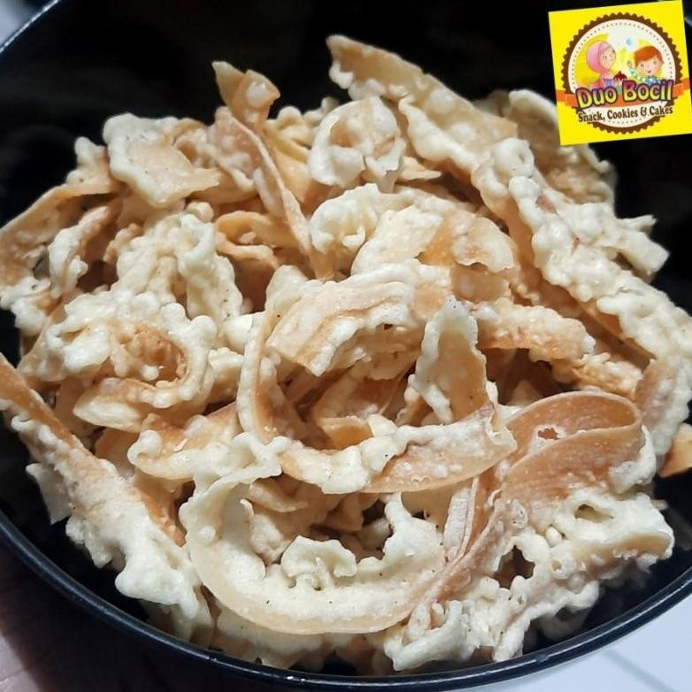 

Keripik Kelapa Muda Manis - Coconut Chips 250 Gram - Duo Bocil Snack