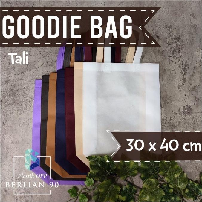 

#####] Goodie Bag Tali 30x40 Tas Spunbond Standing Handle Tas kain Per Pack