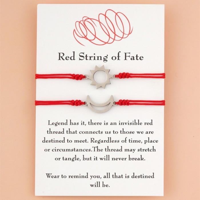 

TERLARIS - GELANG TALI MERAH BAHAN STAINLESS STEEL AKSEN MATAHARI DAN BULAN