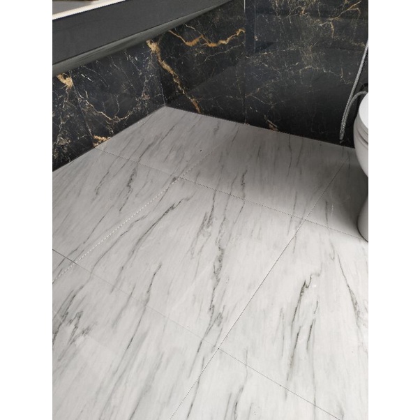 Granit Glosy Ukuran 60x60 Artic Breeze Motif Marmer putih by Sunpower Warna putih Corak Abu/Kualitas