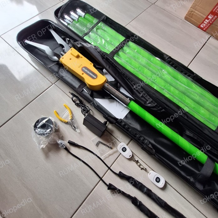 

ALAT PENGIKAT/MERAPIKAN KABEL FIBER OPTIK UDARA