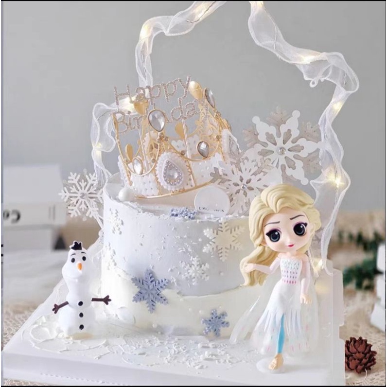 

Toppet cake boneka elsa & istana salju
