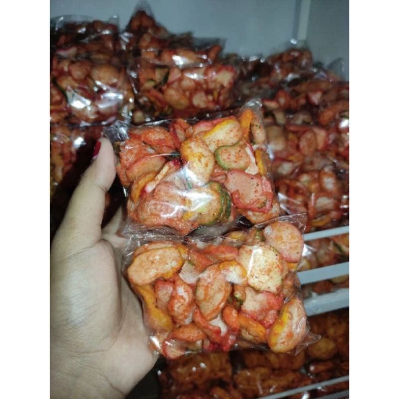 

KRUPUK SEBLAK BULAT ECERAN 30gr / RASA DAUN JERUK PEDAS