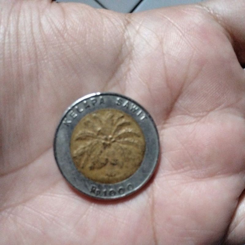 uang koin kuno 1000 kelapa sawit tahun 1994