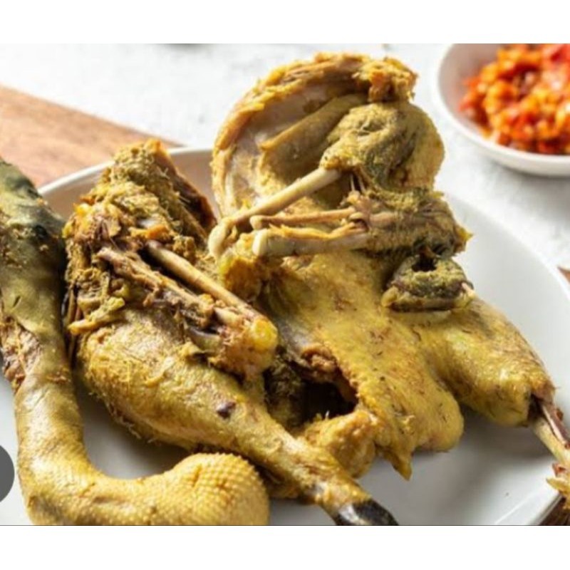 

BEBEK UNGKEP /tinggal goreng/bumbu kuning belah 4 rempah asli