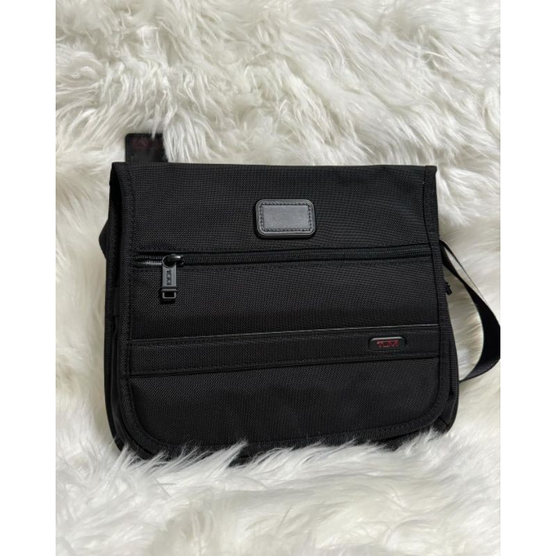 tumi small flap crossbody